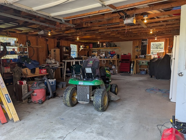 1057 Stony Fork Rd, Wellsboro, PA 16901 - garage with a garage door opener and a workshop area