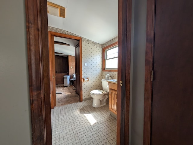 1057 Stony Fork Rd, Wellsboro, PA 16901 - bathroom with vanity, tile patterned floors, toilet, and wallpapered walls