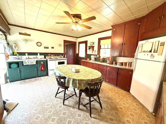 10598 Leetonia Rd, Gaines, PA 16921 - kitchen with freestanding refrigerator, ornamental molding, light countertops, a ceiling fan, and light colored carpet