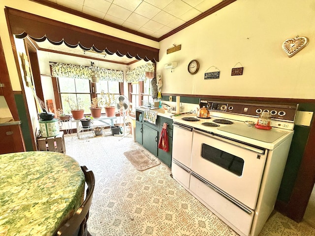 10598 Leetonia Rd, Gaines, PA 16921 - kitchen featuring white electric stove, ornamental molding, light countertops, and tile patterned floors