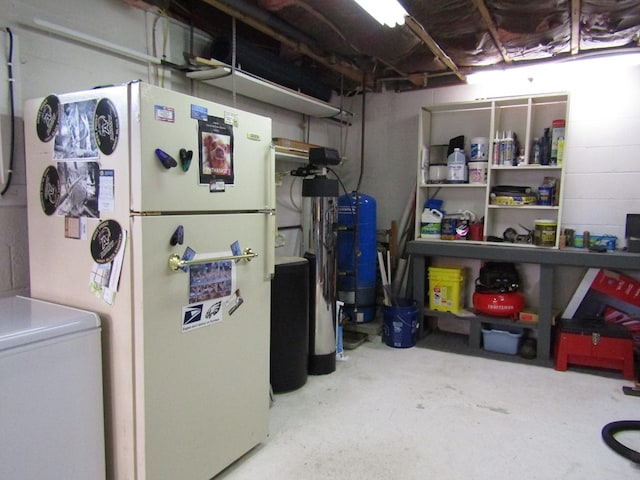 basement featuring white fridge