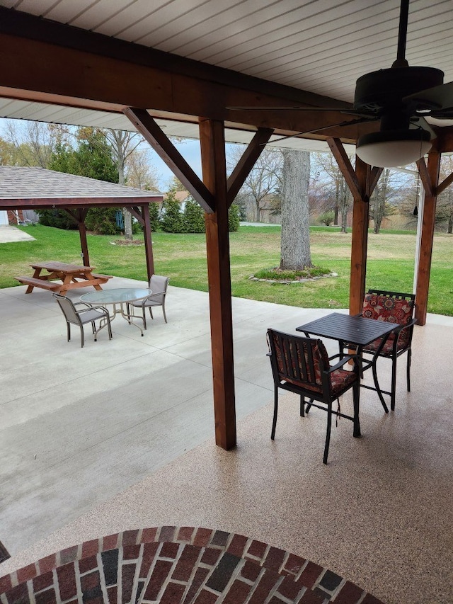 view of patio featuring ceiling fan