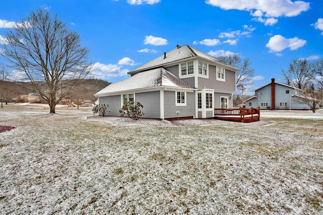 rear view of house with a deck