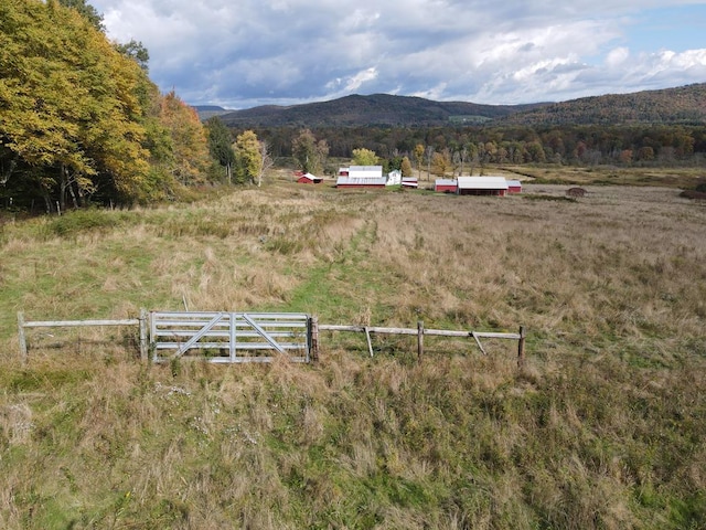 mountain view featuring a rural view