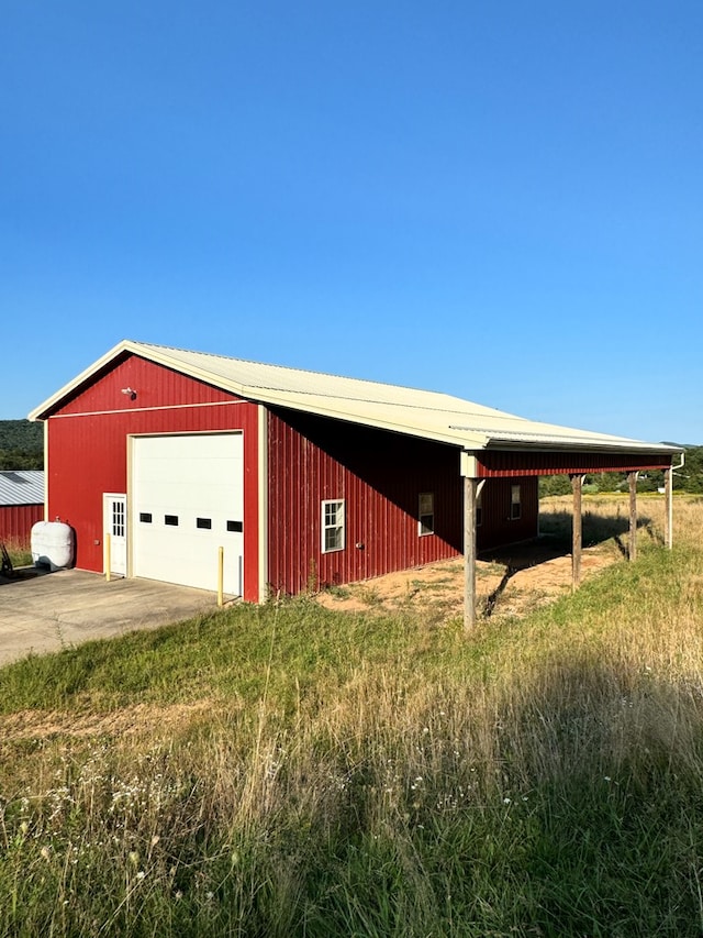 view of outbuilding with a garage