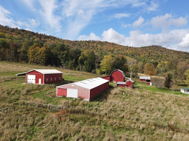 exterior space with a mountain view and a rural view