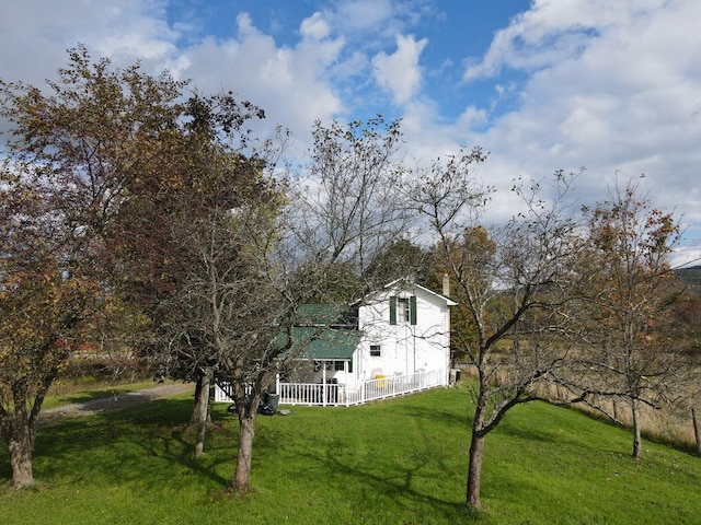 view of yard with covered porch