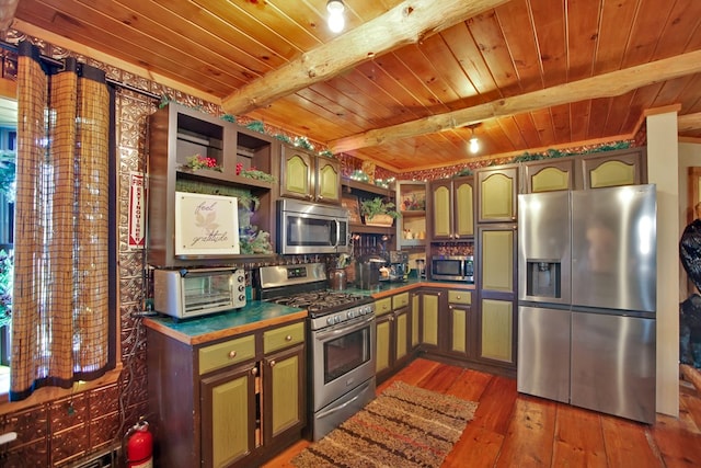 kitchen with beamed ceiling, dark hardwood / wood-style flooring, stainless steel appliances, and wood ceiling