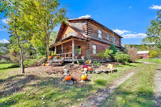 view of home's exterior with a yard