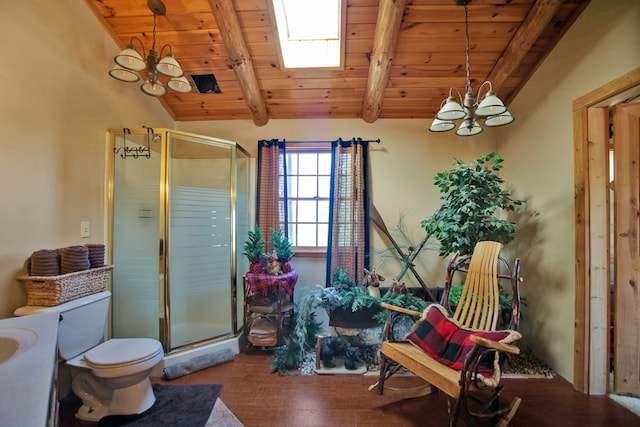 bathroom with hardwood / wood-style floors, lofted ceiling with skylight, wooden ceiling, a shower with door, and an inviting chandelier