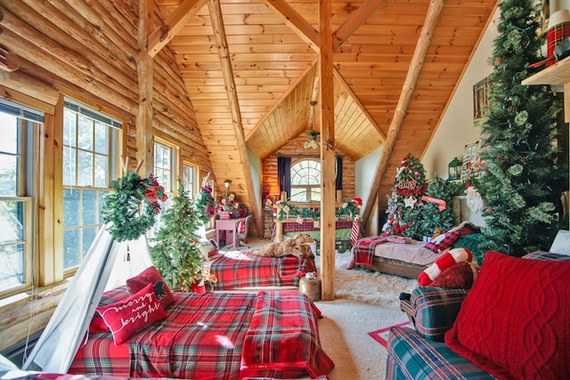 interior space with carpet flooring, vaulted ceiling with beams, and wooden ceiling