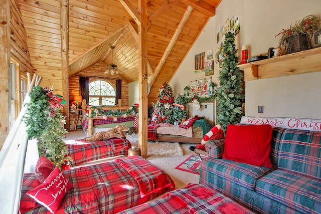 interior space featuring vaulted ceiling with beams, ceiling fan, wood ceiling, and carpet flooring