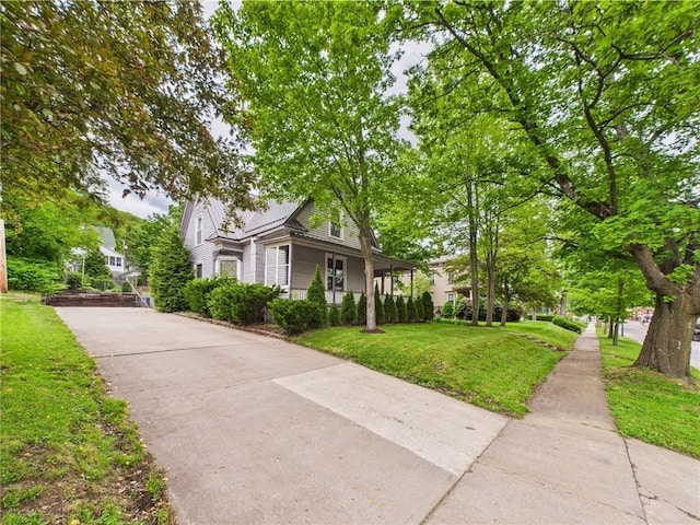 712 W Main St, Smethport, PA 16749 - view of front of home featuring a front lawn and concrete driveway