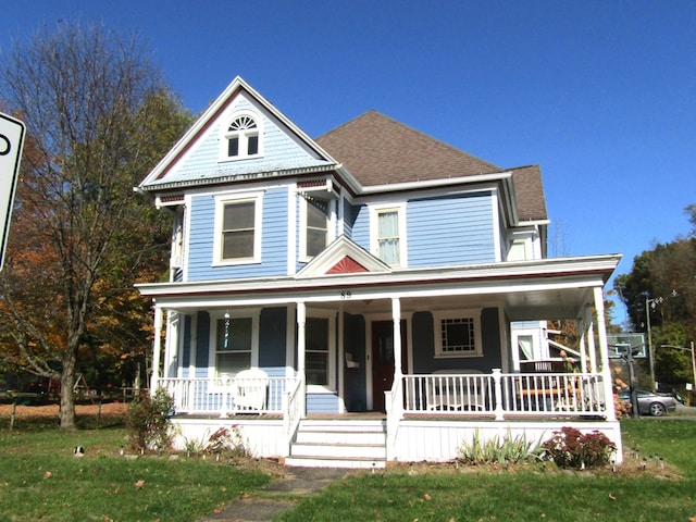 victorian home featuring a porch