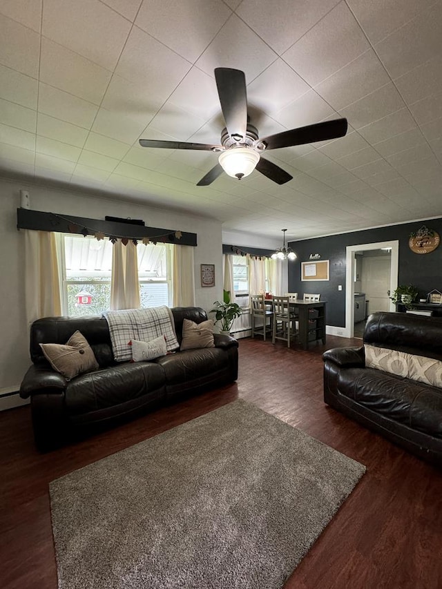 living room with dark hardwood / wood-style floors and ceiling fan