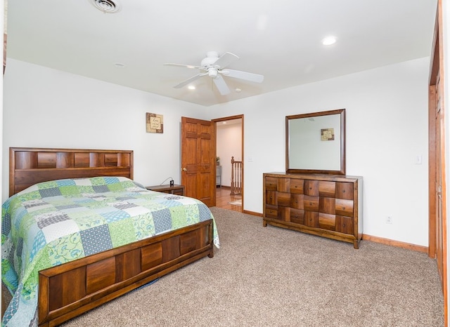 bedroom featuring recessed lighting, carpet, and baseboards