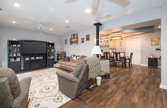 living room featuring recessed lighting, wood finished floors, visible vents, and ceiling fan