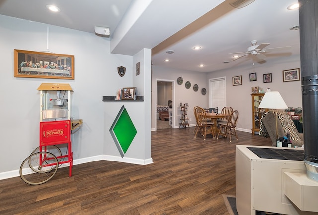 interior space featuring recessed lighting, baseboards, dark wood-style floors, and ceiling fan