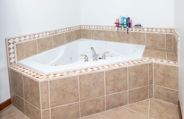 bathroom with a whirlpool tub