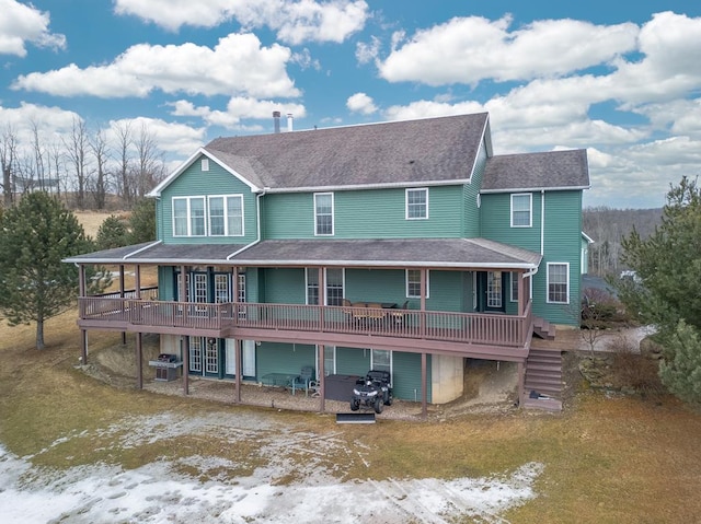 back of house featuring a patio area, stairway, a wooden deck, and a shingled roof