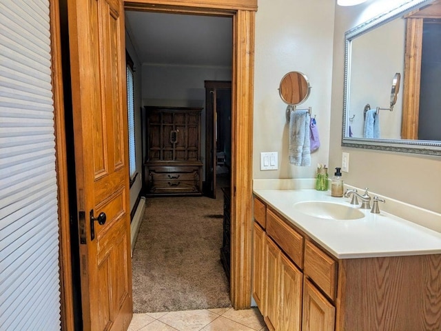 bathroom with tile patterned floors and vanity