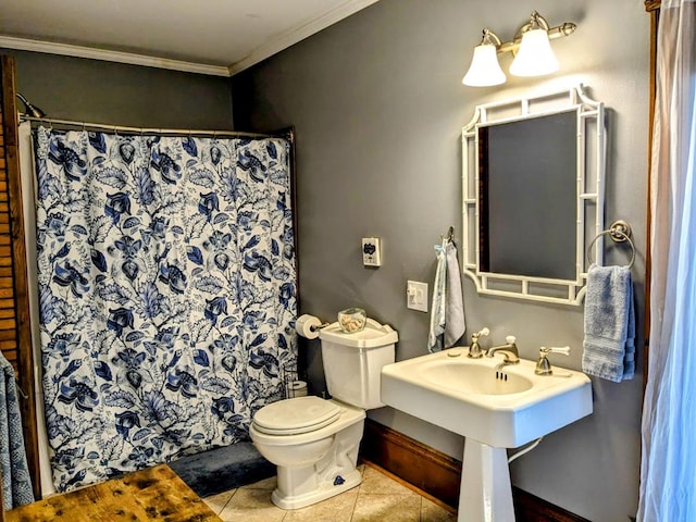 bathroom with tile patterned floors, a shower with curtain, toilet, and ornamental molding