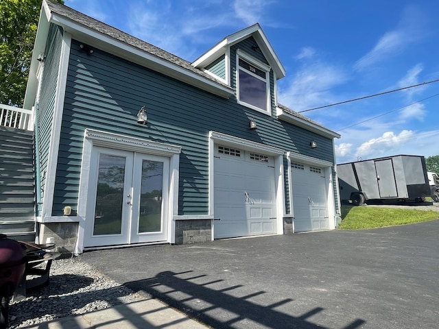 view of side of home with french doors