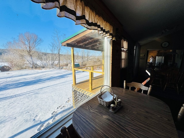 view of snow covered deck