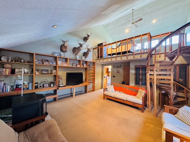 living room featuring lofted ceiling, carpet floors, and a textured ceiling