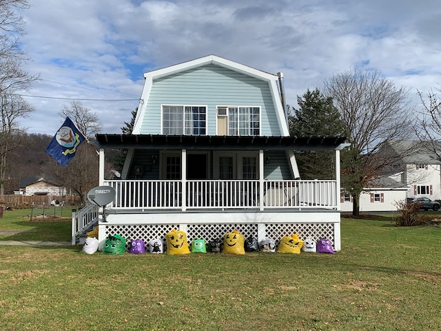 country-style home with a front yard and a porch