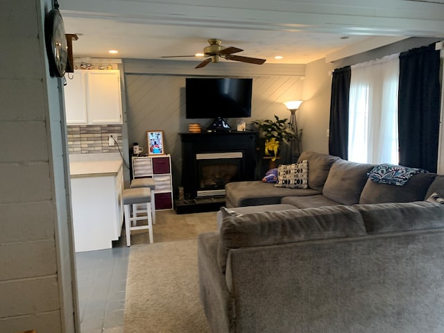 living room featuring ceiling fan