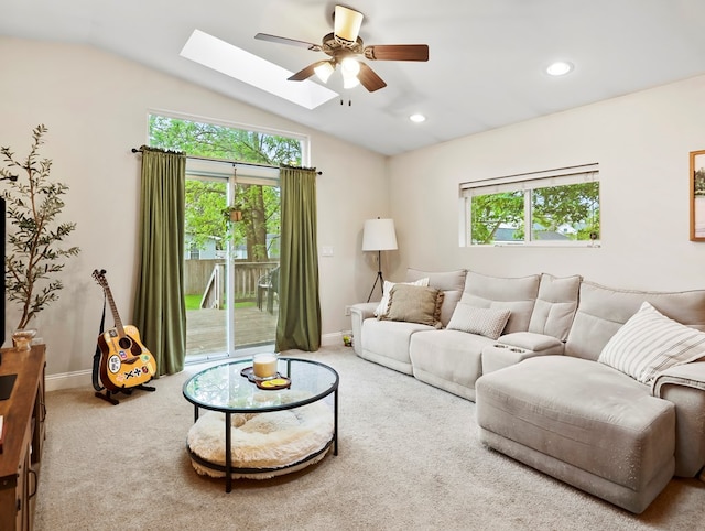 109 Alden St, Sayre, PA 18840 - living room with ceiling fan, carpet, lofted ceiling, a skylight, and baseboards