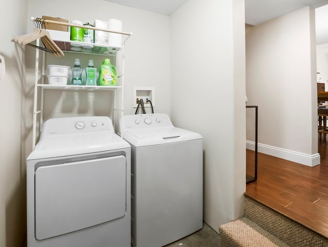 109 Alden St, Sayre, PA 18840 - washroom featuring washing machine and dryer, wood finished floors, and baseboards