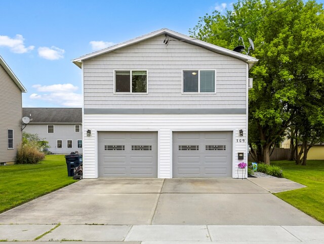 109 Alden St, Sayre, PA 18840 - view of front of house featuring an attached garage, a front lawn, and driveway