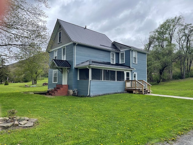 19 Kline Rd, Galeton, PA 16922 - view of home's exterior featuring a yard, metal roof, a standing seam roof, and entry steps