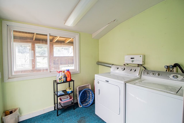 laundry room with carpet flooring and separate washer and dryer