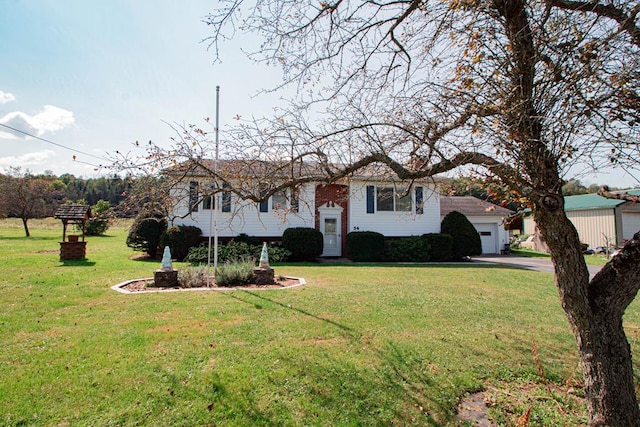 raised ranch with a front lawn