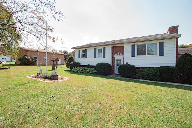 view of front of home featuring a front lawn