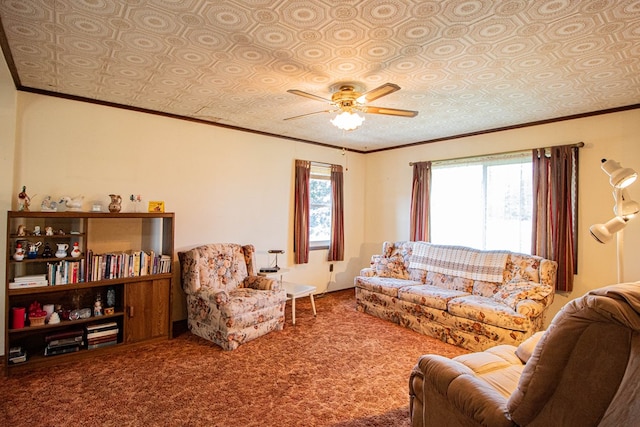 carpeted living room with ceiling fan and ornamental molding