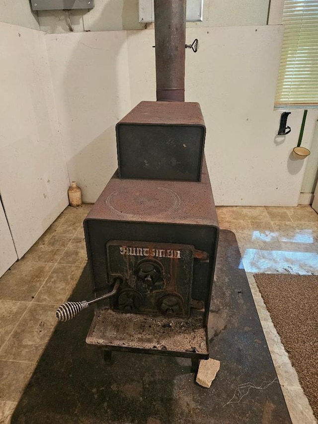225 Logue Run Rd, Austin, PA 16720 - detailed view of a wood stove