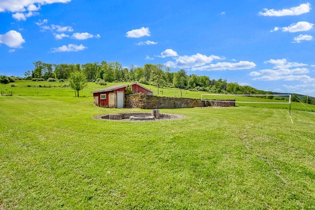 1349 Hills Creek Rd, Wellsboro, PA 16901 - view of grassy yard featuring an outdoor structure and a view of countryside