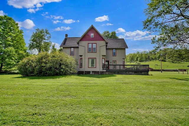 1349 Hills Creek Rd, Wellsboro, PA 16901 - back of house featuring a deck, a chimney, a lawn, and roof with shingles