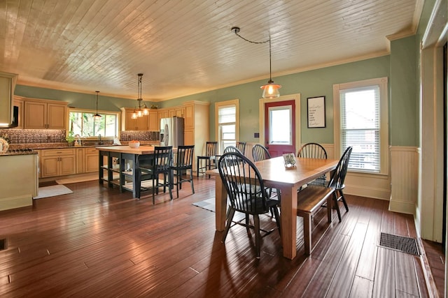 1349 Hills Creek Rd, Wellsboro, PA 16901 - dining area featuring crown molding, wainscoting, and dark wood-style floors