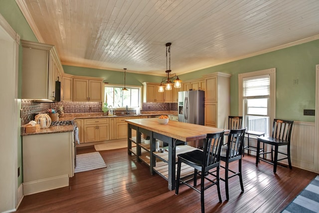 1349 Hills Creek Rd, Wellsboro, PA 16901 - kitchen with appliances with stainless steel finishes, crown molding, a sink, decorative backsplash, and pendant lighting