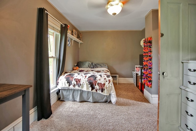 1349 Hills Creek Rd, Wellsboro, PA 16901 - carpeted bedroom featuring multiple windows, ceiling fan, and baseboards