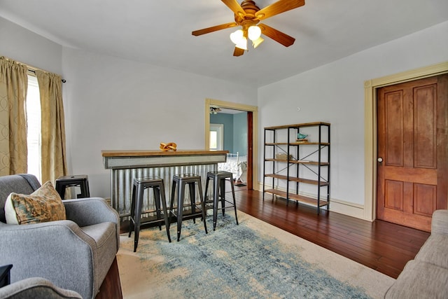1349 Hills Creek Rd, Wellsboro, PA 16901 - living area with ceiling fan, hardwood / wood-style floors, and a bar