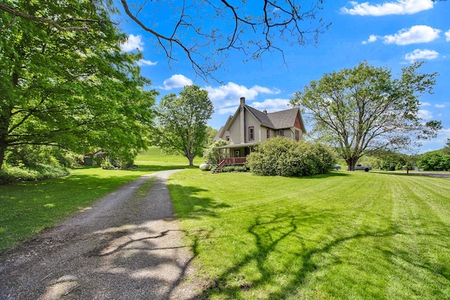 1349 Hills Creek Rd, Wellsboro, PA 16901 - view of home's exterior featuring a chimney and a lawn