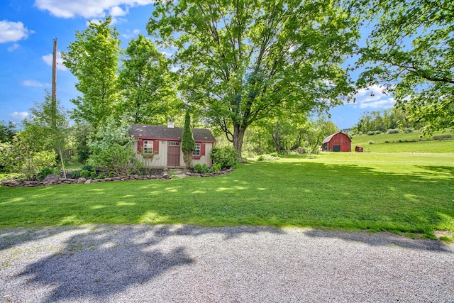1349 Hills Creek Rd, Wellsboro, PA 16901 - view of green lawn with an outdoor structure and a barn