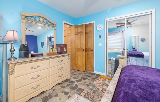 bedroom featuring ceiling fan