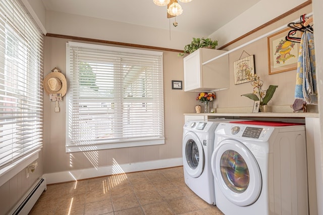 5 Eberenz St, Wellsboro, PA 16901 - clothes washing area featuring washing machine and clothes dryer, cabinet space, a healthy amount of sunlight, and baseboard heating